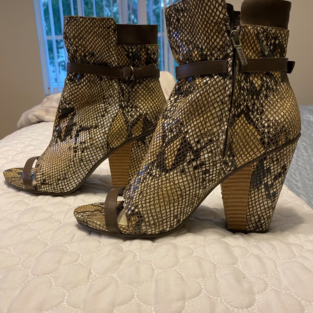 Women Tsubo Python snake leather ankle peep toe boots.